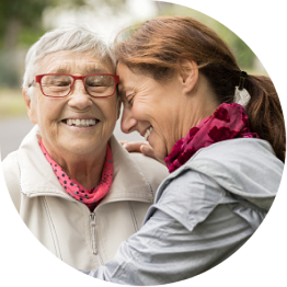 Woman and daughter hugging