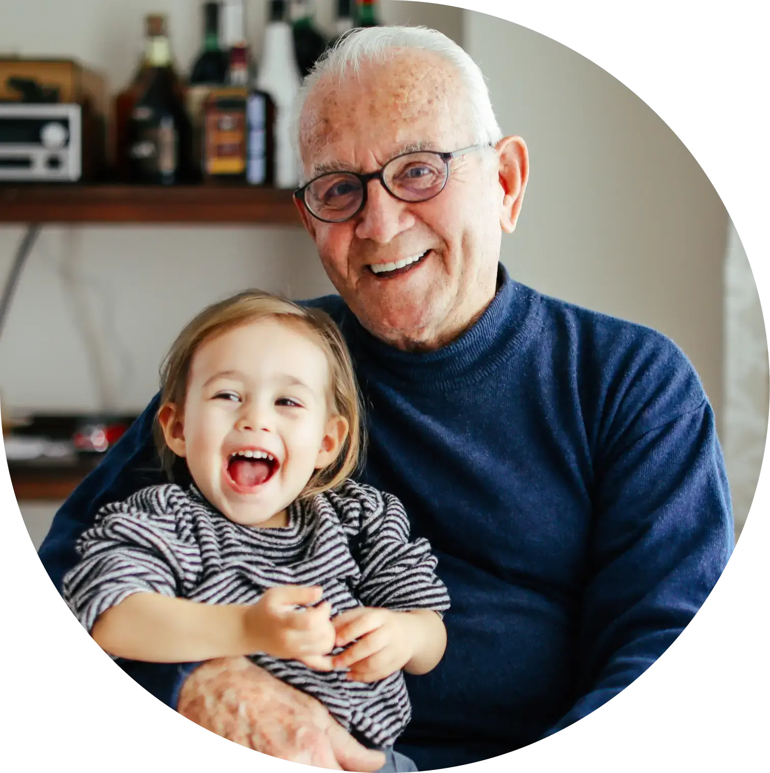 Grandad and grandchild smiling